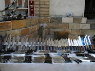 423886713 Samarkand, Uzbekistan, knives at covered central market